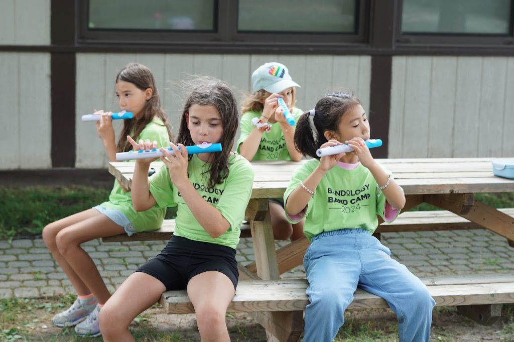 Junior Campers playing with flutes