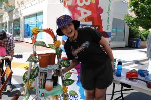 Bandology staff showing off products at a Community Event