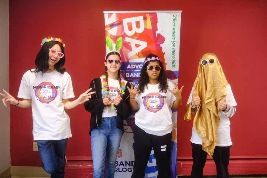 Band Campers posing with props and sunglasses during Bandology Music Camp